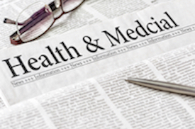 Picture of a newspaper with a pen and pair of glasses lying on top of it. The paper says:
Health & Medcial