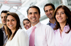 Picture of a group of Department Managers smiling. There is 3 females and 3 males)